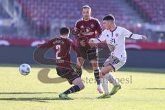 Testspiel; 1. FC Nürnberg - FC Ingolstadt 04 - Zweikampf Kampf um den Ball Felix Keidel (43, FCI) Villadsen Oliver (2 FCN) Justvan Julian (10 FCN)