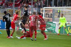 3.Liga - Saison 2022/2023 - SC Freiburg II - FC Ingolstadt 04 - Calvin Brackelmann (Nr.17 - FCI) - Torwart Uphoff Benjamin (Nr.12 - SC Freiburg II) - Julian Guttau (Nr.36 - SC Freiburg II) - Justin Butler (Nr.31 - FCI)  - Foto: Meyer Jürgen