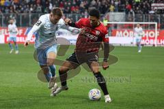 3. Liga; FC Ingolstadt 04 - TSV 1860 München; Zweikampf Kampf um den Ball Justin Butler (31, FCI) Lang Niklas (3 TSV)