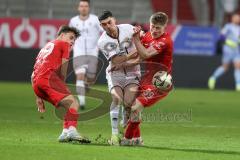 3. Liga - Saison 2024/25 - FC Ingolstadt 04 - SpVgg Unterhaching - Felix Keidel (Nr.43 - FCI) - Dennis Waidner (Nr.39 - Unterhaching) - Foto: Meyer Jürgen