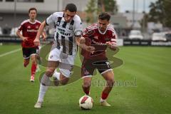 Saison 2026/27 - Freundschaftsspiel - 1. FC Nürnberg - FC Ingolstadt 04 - Ognjen Drakulic (Nr.30 - FCI) - Andrea Ceresoli (Nr.14 - FCN) - Foto: Meyer Jürgen