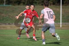 Kreisliga - Saison 2026/27 - SV Zuchering - VFB Eichstätt II - Leander Friedl rot Zuchering - Niklas Matzel rosa Eichstätt II  #16 - Reybek Khashumov rosa Eichstätt II  #25  - Foto: Meyer Jürgen