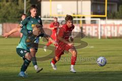 Bayernliga Nord - Saison 2023/2024 - FC Ingolstadt 04 - SSV Jahn Regensburg - Leon Nuhanovic rot FCI - Luis Bezjak grün Regensburg - Foto: Meyer Jürgen