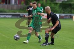 Bezirksliga - Saison 2023/2024 - SV Manching  - SV Sulzemoos - Joahnnes Dexl (Nr.13 - SV Manching) - Ranftl Sebastian schwarz Sulzemoos - Foto: Meyer Jürgen