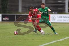 Landesliga - Saison 2024/25 - SV Manching - FSV Pfaffenhofen - Dominik Schröder (Nr.14 - SV Manching) - Maurice Untersänger rot Pfaffenhofen - Foto: Meyer Jürgen