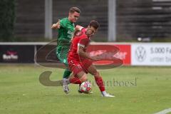 Landesliga - Saison 2024/25 - SV Manching - FSV Pfaffenhofen - Dominik Schröder (Nr.14 - SV Manching) - Maurice Untersänger rot Pfaffenhofen - Foto: Meyer Jürgen