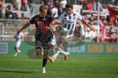 3. Liga - Saison 2026/27 - Victoria Köln - FC Ingolstadt 04  - Tim Kloss (Nr.18 - Viktoria Köln) - Fredrik Carlsen (Nr.8 - FCI) - Foto: Meyer Jürgen