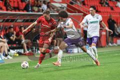 3. Liga; FC Ingolstadt 04 - Erzgebirge Aue; Zweikampf Kampf um den Ball Simon Lorenz (32, FCI) Fabisch Jonah (20 Aue) Bär Marcel (15 Aue)