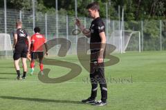 Bayernliga - Saison 2023/2024 - FC Ingolstadt 04 II - U21 - Trainingsauftakt - Cheftrainer Thomas Karg (FCI II) mit Stoppuhr - Foto: Meyer Jürgen