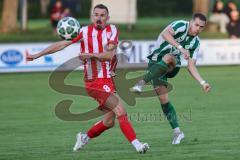 Landesliga - Saison 2025/26 - SV Manching - TSV Dachau  - Fabian  Neumayer (Nr.9 - SV Manching) - Sebastian Mitterhuber rot Dachau - Foto: Meyer Jürgen