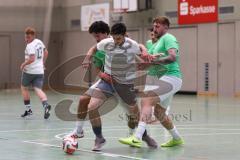 Hallenturnier Ingolstadt Nord - Saison 2024/25 - MBB SG MAnching - FC Fatih Ingolstadt  - Daniel Powel weisss Manching - Mert Karatas grün Fatih - Sebastian Rutkowski grün Fatih rechts - Foto: Meyer Jürgen