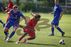 Kreisliga - Saison 2026/27- TSV Großmehring - SV Zuchering - Maximilian Hamm blau Großmehring - Robel Kahsay rot Zuchering - Foto: Meyer Jürgen