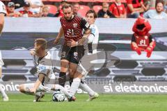 3. Liga; FC Ingolstadt 04 - SSV Ulm 1846; Zweikampf Kampf um den Ball David Kopacz (29, FCI) #u6#Brandt Max (23 Ulm) Gaal Tom (4 Ulm)