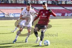 Testspiel; 1. FC Nürnberg - FC Ingolstadt 04 - Mladen Cvjetinovic (19, FCI) Emreli Mahir (30 FCN)