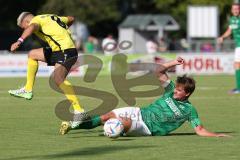 Kreisliga - Saison 2023/2024 - FC Gerolfing - FC Hitzhofen/Oberzell - Philipp Haunschild grün Gerolfing - Fardin Gholami gelb Hitzhofen - Foto: Meyer Jürgen