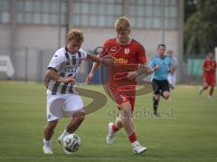 Bayernliga Nord - Saison 2026/27 - FC Ingolstadt 04 II - Jahn Regensburg II - Manuel Distl (Nr.9 - FCI II) - Raphael Steudtner rot Regensburg - Foto: Meyer Jürgen