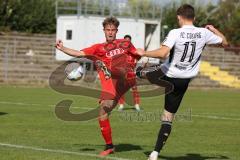 Bayernliga Nord - Saison 2023/2024 - FC Ingolstadt 04 - FC Coburg - Jeroen Krupa rot FCI - Ricardo König weiss Coburg - Foto: Meyer Jürgen