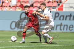 3. Liga; FC Ingolstadt 04 - SV Wehen Wiesbaden; Zweikampf Kampf um den Ball Gustav Christensen (24, FCI) Wohlers Ole (21 SVWW)