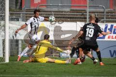 3. Liga - Saison 2026/27 - Victoria Köln - FC Ingolstadt 04  - Torwart Arne Schulz (Nr.1 - Viktoria Köln) - Fredrik Carlsen (Nr.8 - FCI) - Foto: Meyer Jürgen