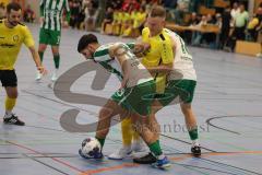 Lotto Bayern Hallencup - Lindenkreuzhalle Saison 2024/25 - FC Hitzhofen - SV Manching - Nico Seitz gelb Hitzhofen - Lucas Zeitler #18 Manching grün - Rayen Kouki #13 grün Manching - Foto: Meyer Jürgen