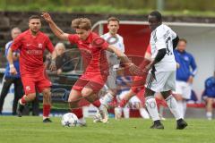 Kreisliga - Saison 2025/26- SV Zuchering - FC Mindelstetten - Philip Delanowski rot Zuchering - Qusseynou Tamba weiß Mindelstetten  - Foto: Meyer Jürgen