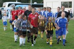 FC Ingolstadt 04 - FC Sternstunden - Charity - Einmarsch der 2 Mannschaften. links Stefan Leitl und rechts Carsten Wettberg als Kapitän