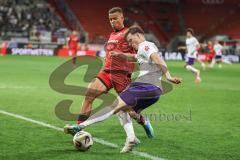 3. Liga; FC Ingolstadt 04 - Erzgebirge Aue; Zweikampf Kampf um den Ball Marcel Costly (22, FCI) Seiffert Moritz (30 Aue)
