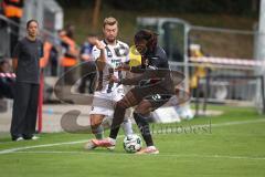 3. Liga - Saison 2026/27 - Victoria Köln - FC Ingolstadt 04  - Yannick Deichmann (Nr.20 - FCI) - Tonyw Yannick Aime (Nr.7 - Viktoria Köln) - Foto: Meyer Jürgen