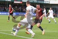 3.Liga - Saison 2023/2024 - SC Verl - FC Ingolstadt 04 - Felix Keidel (Nr.43 - FCI) - Torge Paetow (Nr.16 - Verl) -  - Foto: Meyer Jürgen