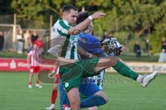 Landesliga - Saison 2025/26 - SV Manching - TSV Dachau  - Fabian  Neumayer (Nr.9 - SV Manching) - Marco Kakob Torwart DAchau - Foto: Meyer Jürgen