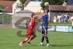 Kreisliga - Saison 2025/26- TSV Kösching - FC Mindelstetten - Benedikt Schneeberger rot Kösching - Marcel Kappelmaier blau Mindelstetten - Foto: Meyer Jürgen