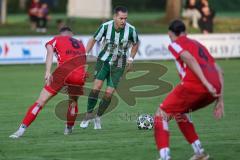Landesliga - Saison 2025/26 - SV Manching - TSV Dachau  - Fabian  Neumayer (Nr.9 - SV Manching) - Sebastian Mitterhuber rot Dachau - Foto: Meyer Jürgen