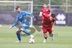 3. Liga; Testspiel; FC Ingolstadt 04 - 1. FC Heidenheim; Zweikampf Kampf um den Ball Frederik Christensen (11, FCI) Niehues Julian (16 HDH)