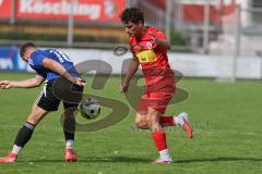 Kreisliga - Saison 2025/26- TSV Kösching - FC Mindelstetten - Lukas Gaul blau Mindelstetten - David Ostermeier rot Kösching - Foto: Meyer Jürgen