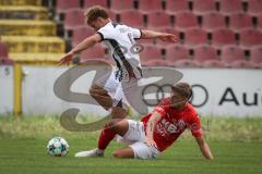Bayernliga Nord - Saison 2026/27 - FC Ingolstadt 04 II - ASV Cham - Manuel Distl (Nr.9 - FCI II) - Alexander Sigl rot Cham - Foto: Meyer Jürgen