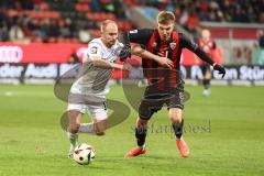 3. Liga; FC Ingolstadt 04 - Energie Cottbus; Zweikampf Kampf um den Ball Benjamin Kanuric (8, FCI) Hasse Tobias (14 ECO)