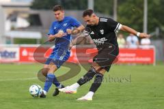 Bezirksliga - Saison 2025/26- TSV Gaimersheim - ASV Dachau - Domenic Raimann schwarz Gaimersheim - Mathias Cebulla  blau Dachau - Foto: Meyer Jürgen