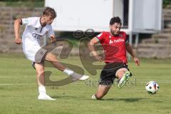 A-Junioren - DFB Pokal  - Saison 2024/25 - A-Junioren - FC Ingolstadt 04 - Hannover 96 - Keller Tom weiss FCI - Moser Ammon rot Hannover - Foto: Meyer Jürgen