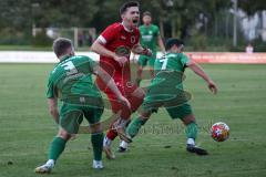 Landesliga - Saison 2024/25 - SV Manching - FSV Pfaffenhofen - Luca Oehler (Nr.3 - SV Manching) - Michael Senger rot Pfaffenhofen - Stefan Müller (Nr.7 - SV Manching) - Foto: Meyer Jürgen