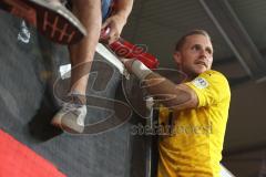 Toto-Pokal - Saison 2023/2024 - FC Ingolstadt 04 - Jahn Regensburg - Elmeterschießen gewonnen - jubel - Torwart Marius  Funk (Nr.1 - FCI) hält den Elfmeter - auf dem weg zu den Fans - Megaphon - Foto: Meyer Jürgen