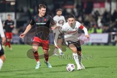 3. Liga; SC Verl - FC Ingolstadt 04; Jonas Scholz (15, FCI) Zweikampf Kampf um den Ball Gayret Timur (30 Verl)