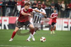 Saison 2026/27 - Freundschaftsspiel - 1. FC Nürnberg - FC Ingolstadt 04 - Joseph Ganda (Nr.16 - FCI) - Styopa Mkrtchyan (Nr.5 - FCN) - Foto: Meyer Jürgen