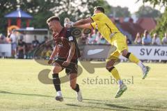 Testspiel; 3. Liga; VfB Eichstätt - FC Ingolstadt 04; Torwart Tim Teicher boxt den Ball von Julian Kügel (31, FCI) weg