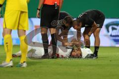 3.Liga - Saison 2023/2024 - Preußen Münster - FC Ingolstadt 04 - Yannick Deichmann (Nr.20 - FCI) verletzt am Boden - Simon  Lorenz (Nr.32 - FCI) -  - Foto: Meyer Jürgen