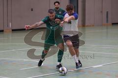 Hallenturnier Ingolstadt Nord - Saison 2024/25 - FC Geisenfeld - TSV Etting - Stean Hoffmann grün Geisenfeld - Felix Festner weiss Etting - Foto: Meyer Jürgen