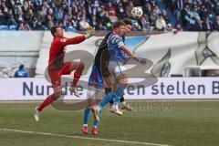 3. Liga - Saison 2025/26 - Hansa Rostock - FC Ingolstadt 04  - Torwart Benjamin Uphoff (Nr.1 - Hansa Rostock) - Julian Kügel (Nr.29 - FCI) - Foto: Meyer Jürgen