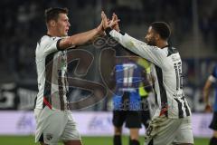 3. Liga - Saison 2026/27 - Waldhof Mannheim - FC Ingolstadt 04 - Max Plath (Nr.14 - FCI) schiesst den 0:2 Führungstreffer — jubel -  Jonas Scholz (Nr.15 - FCI) - Keanan Bennetts (Nr.18 - FCI)- Foto: Meyer Jürgen