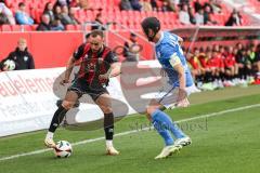 3. Liga; FC Ingolstadt 04 - FC Hansa Rostock; Zweikampf Kampf um den Ball David Kopacz (29, FCI) Roßbach Damian (4 HR)