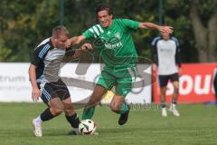 Bezirksliga - Saison 2025/26 - TSV Ober./Unterhaunstadt - SVA Palzing - Florian Diegel (Nr.10 - TSV Ober-/Unterh.stadt) - Marcel Radlmaier grün Palzing - Foto: Meyer Jürgen