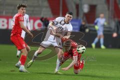 3. Liga - Saison 2024/25 - FC Ingolstadt 04 - SpVgg Unterhaching - Felix Keidel (Nr.43 - FCI) - Dennis Waidner (Nr.39 - Unterhaching) - Foto: Meyer Jürgen